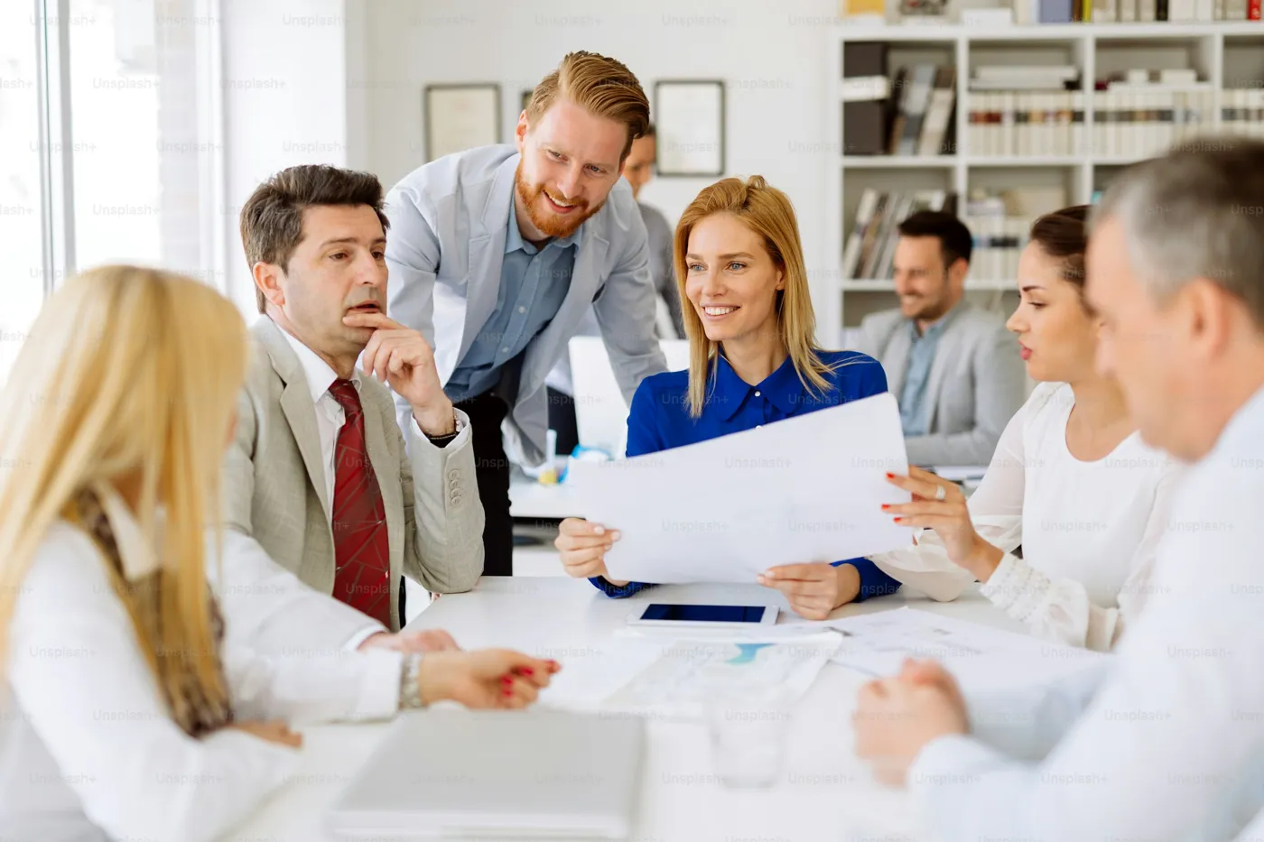 The ValueSoft team reviewing a report together